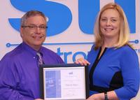 Stacey Sipes’ 15-year anniversary.David Raby, President/CEO, presented her with a certificate in appreciation. 